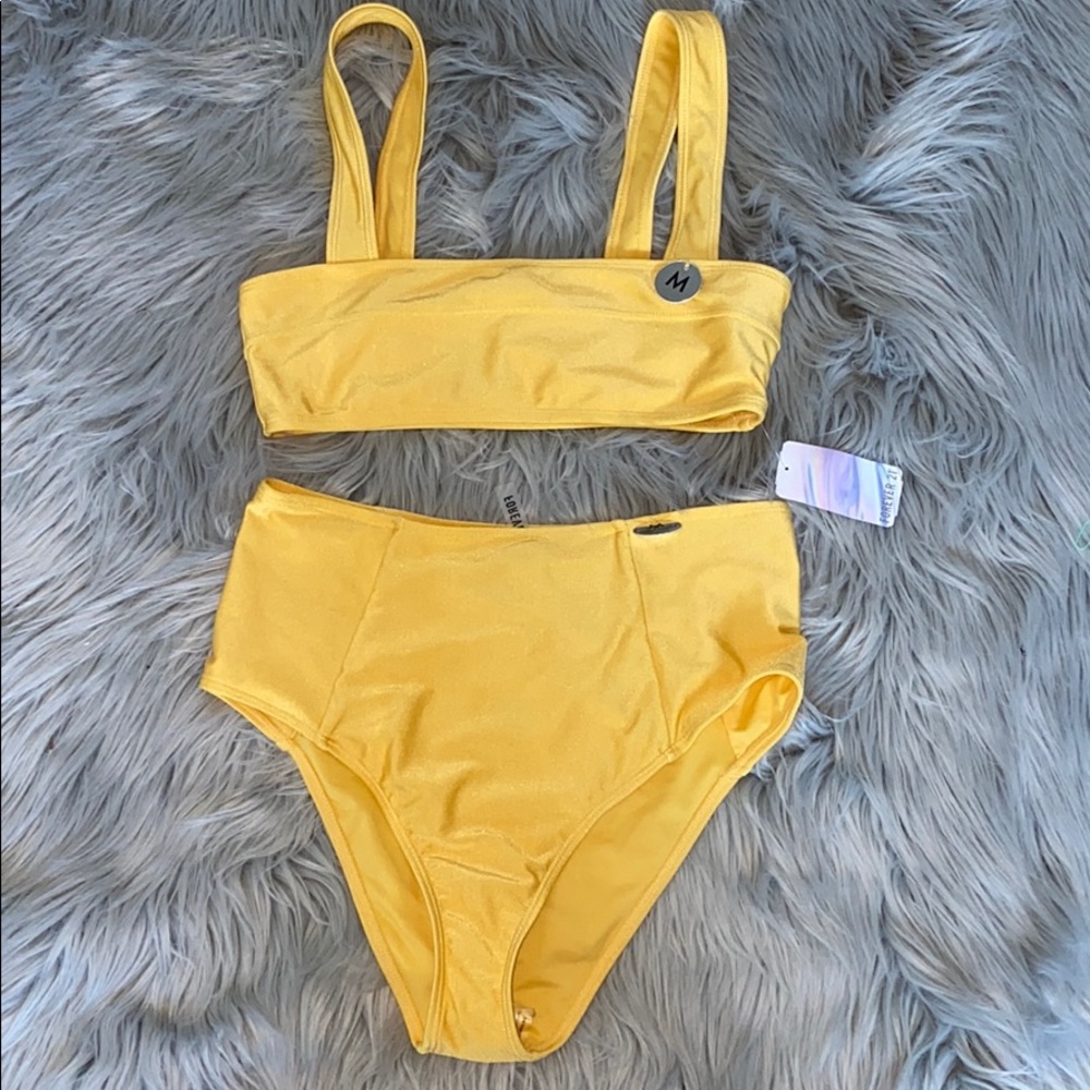 Yellow two piece swimsuit.